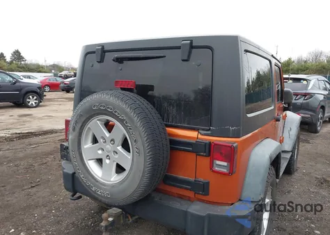 2011 Jeep Wrangler Sport z USA, uszkodzony, nr VIN 1J4AA2D18BL502847